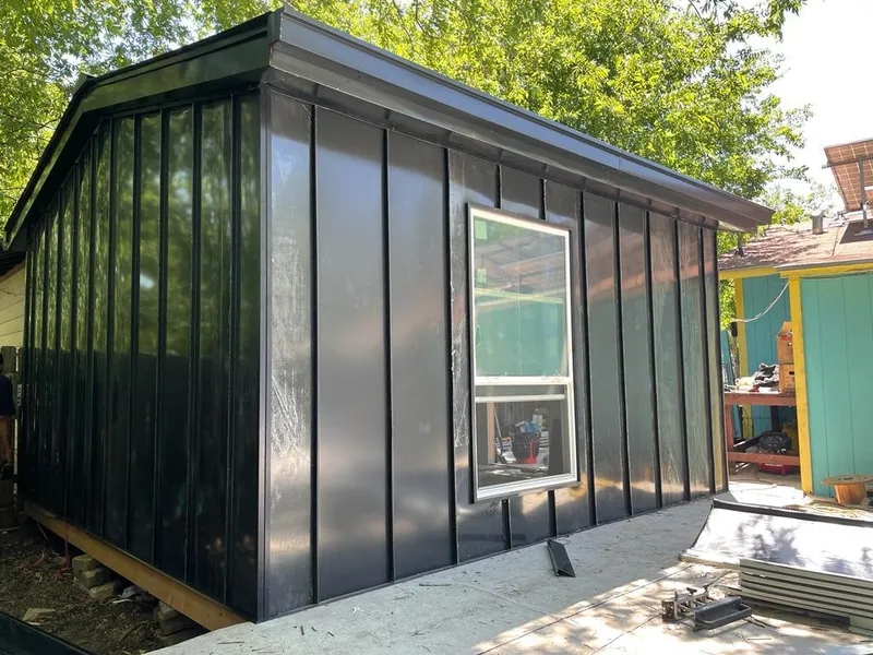 Black standing seam metal wall panels for Metal Roof Installation in Glennville